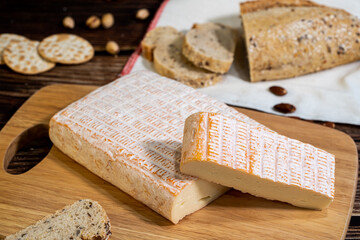 A big block of cheese that everyone likes to eat.