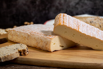 A big block of cheese that everyone likes to eat.