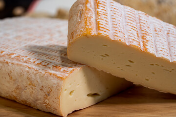 A big block of cheese that everyone likes to eat.