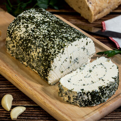 A big block of cheese that everyone likes to eat.