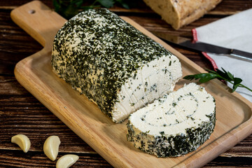 A big block of cheese that everyone likes to eat.