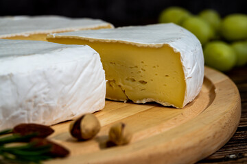 A big block of cheese that everyone likes to eat.