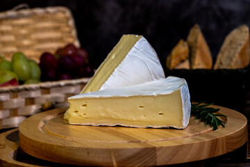 A big block of cheese that everyone likes to eat.