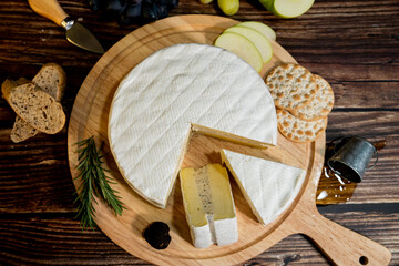 A big block of cheese that everyone likes to eat.