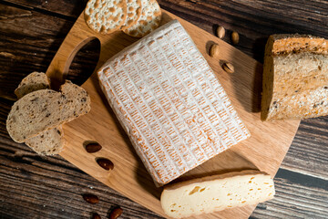 A big block of cheese that everyone likes to eat.