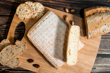 A big block of cheese that everyone likes to eat.