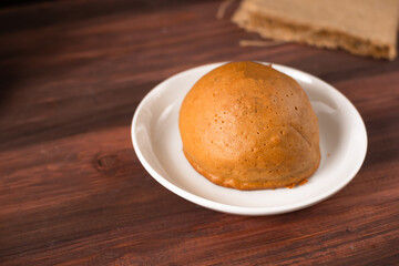 Mexican coffee bun. It is sweet bun with coffee topping and butter as filling