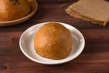 Mexican coffee bun. It is sweet bun with coffee topping and butter as filling