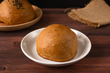 Mexican coffee bun. It is sweet bun with coffee topping and butter as filling