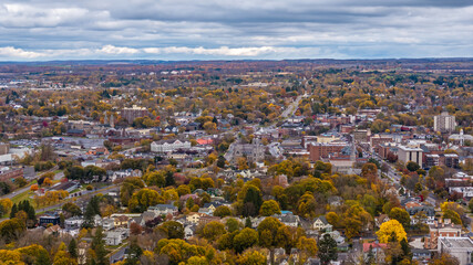 Aerial photo of the fall foliage surrounding the City of Auburn, Cayuga County, New York State, November 2024. 