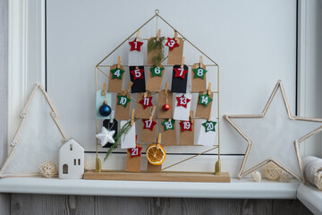 Traditional twenty four days advent calendar before Christmas holidays. Plastic free zero waste...