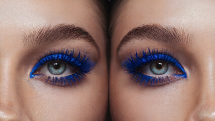 Naklejka premium Electric Blue Mascara, Bold Minimalism: A front-facing close-up of both eyes, where each lash is coated in vibrant electric blue mascara, standing out strikingly against natural, makeup-free skin