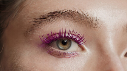Obraz premium stylish minimalism, Neon Purple mascara: a close-up shot of an eye adorned with vibrant Neon Purple mascara on naturally long lashes