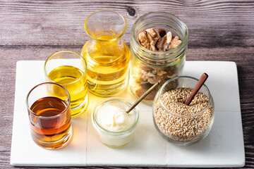 Many kinds of oil - wood background - for healthcare 1