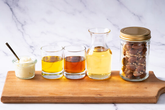 Many kinds of oil - white marble background - for healthcare 2