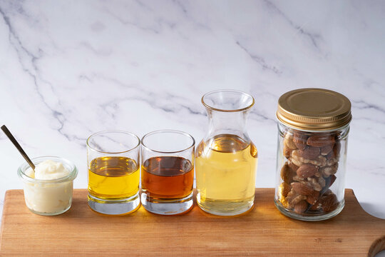 Many kinds of oil - white marble background - for healthcare 1