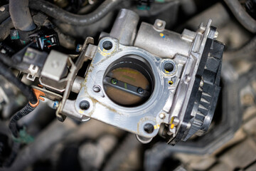 closeup, The engine throttle body regulates the amount of air entering the engine.