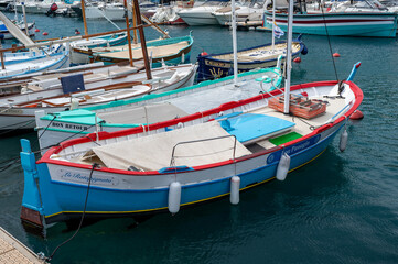 Traditional colorful fishing boats, called pointu in French. in Nice Port, Nice, France on sunny summer day.