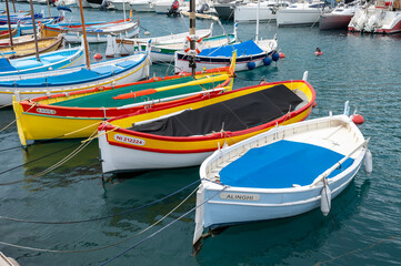 Obraz premium Traditional colorful fishing boats, called pointu in French. in Nice Port, Nice, France on sunny summer day.