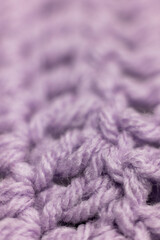 close-up of vertical crochet rows in lilac purple, crocheted or knitted, reminds you of grandma's house, cozy and warm background, macro