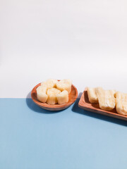 Boiled cassava or singkong rebus served in wooden plate. One of the Healthy food