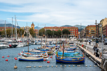 Traditional colorful fishing boats, called pointu in French. in Nice Port, Nice, France on sunny summer day.