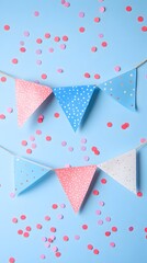 Obraz premium Colorful festive decorations with blue, pink, and white bunting on a pastel background.