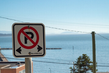 Traffic sign on a beach in, White rock, Canada.