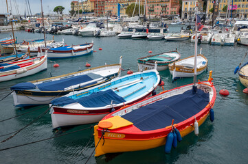 Fototapeta premium Traditional colorful fishing boats, called pointu in French. in Nice Port, Nice, France on sunny summer day.