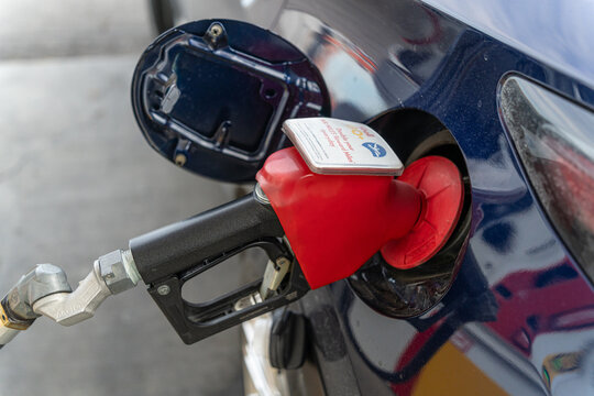 November 2 2024 - Calgary alberta Canada - Pumping gas at shell petrol station