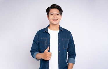 Portrait of young man 
Asian is posing on white background