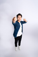 Full body image of a young man posing on a white background