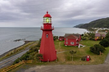 La Martre Lighthouse along the coastline of the St Lawrence River on the Gaspé Peninsula, La...