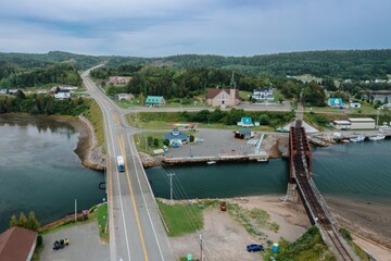 The rural town of Port-Daniel, estuary inlet and route 132 bridge on the Gaspé Peninsula, Quebec,...