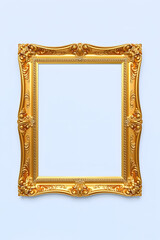 An ornate golden picture frame with intricate designs, set against a light blue wall. The frame is empty, inviting artwork or a mirror to be placed inside.