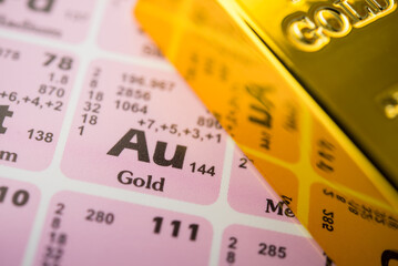 Au (Gold) in the periodic table with gold bar. Gold is popular in commodity trading market investment, price rising all time high, chemistry education concept.  It is safe haven and forex reserves.