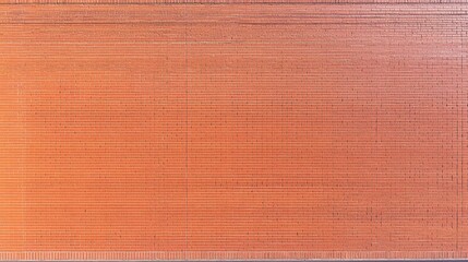 Fototapeta premium Textured Red Brick Wall with Subtle Variations