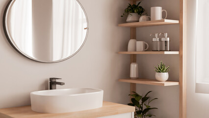 A minimalist Scandinavian bathroom features a round mirror and a sink on a minimal wood counter.