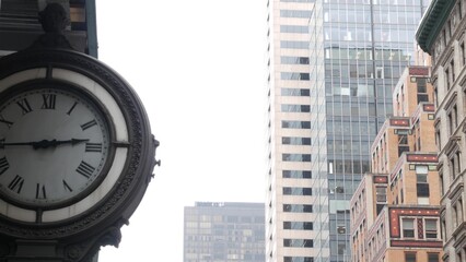 New York City Manhattan Midtown building architecture, urban street in United States. Residential and business real estate and street clock on 5th Fifth 5 avenue in USA.