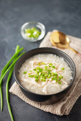Dakjuk. Korean rice chicken porridge with spring onions