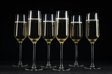 Champagne glasses on a black background