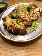 Close-Up of Indian Chicken Black Pepper Tandoori Pieces – Flavorful Grilled Chicken