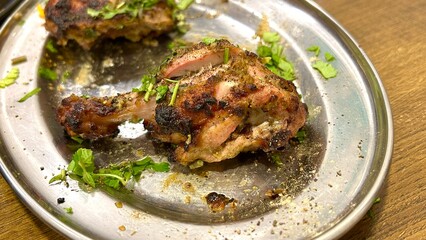 Close-Up of Indian Chicken Black Pepper Tandoori Leg – Spicy Grilled Delicacy