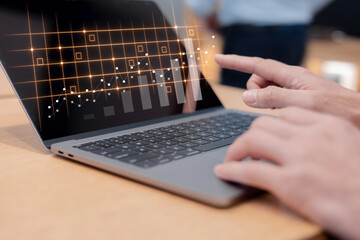 investment and finance concept, businessman touching virtual trading graph and blurred light on...