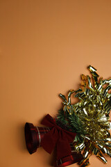 New Year wishes. Golden glitter with red bells . Christmas holiday background, copy space for your design