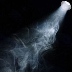 Mysterious Spotlight Through Smoke