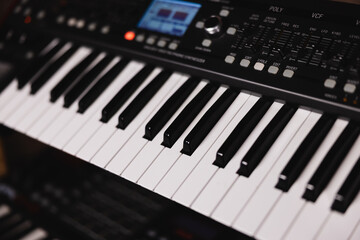 synthesizer piano keys close up