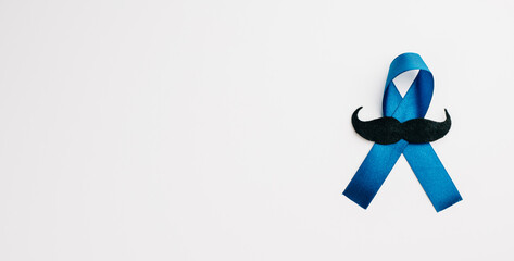 November, a month for Prostate Cancer Awareness, Blue Ribbon with mustache signifies support and...