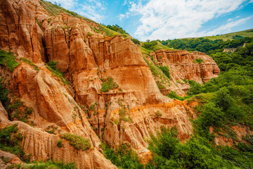 Red rocky slopes Rapa Rosie is a protected geological and floristic reservation area near Sebes alba in Romania