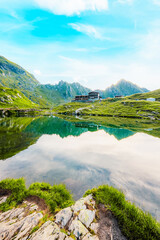 Fototapeta premium Fagaras mountains with Balea lake on Transfagarasan serpentine road in Sibiu County, Romania.